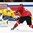 HELSINKI, FINLAND - DECEMBER 26: Switzerland's Tino Kessler #22 stickhandles the puck in front of Sweden's Linus Soderstrom #30 during preliminary round action at the 2016 IIHF World Junior Championship. (Photo by Matt Zambonin/HHOF-IIHF Images)

